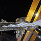 Illustration for article titled Fragile Humans Spacewalk To Upgrade Space Station Communications